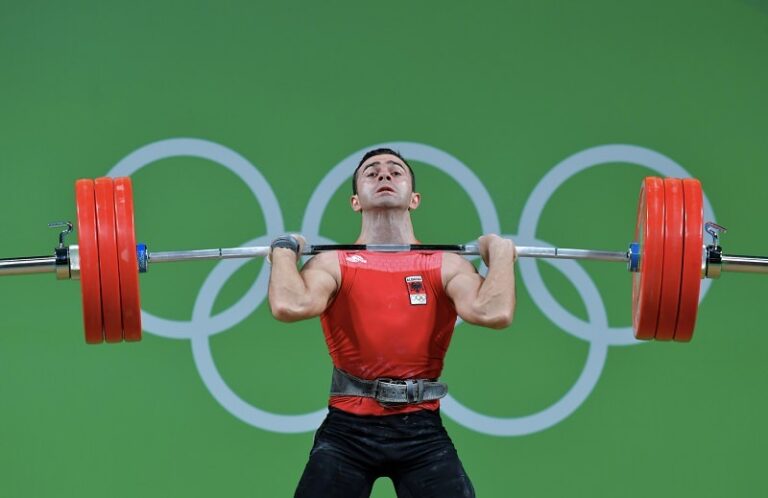 Olympic Weight Lifter with Olympic Rings